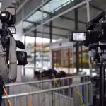 Media relations depicted by showing tv cameras